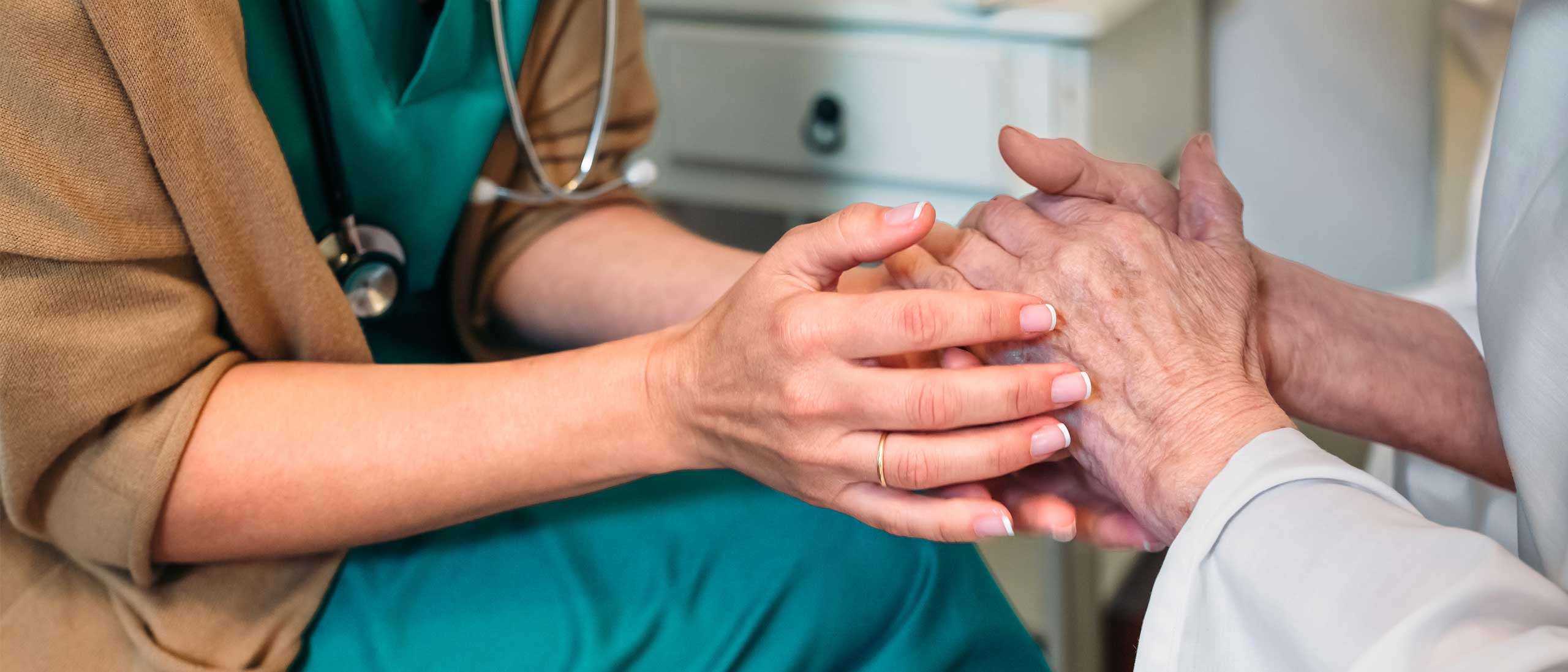 Hospice nurse with patient